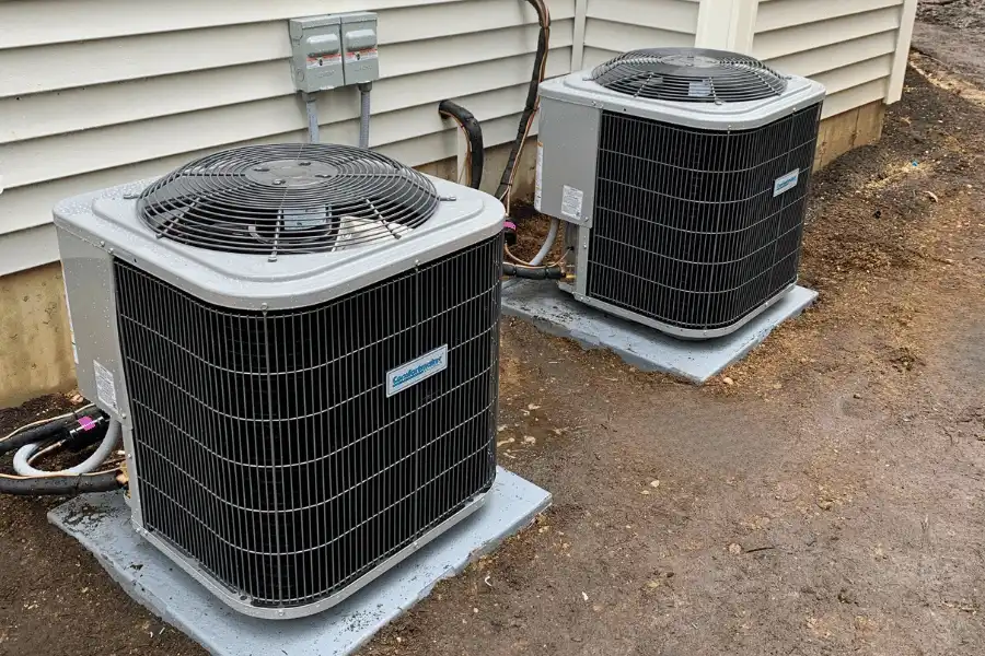 Outside view of air conditioner installation at Suffolk County home